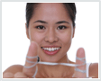 Image of woman flossing